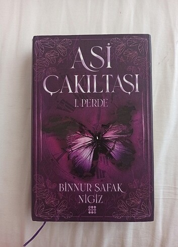 ASI CAKILTASI BINNUR SAFAK NIGIZ