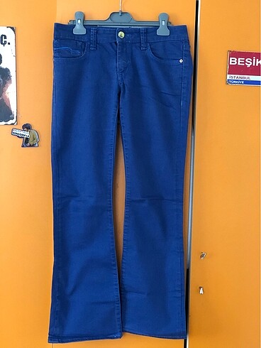 Kadın ispanyol paça düşük bel mavi kot pantolon