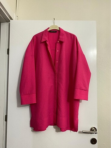 Pembe tunik