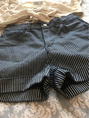 Şıort 30 beden üst. L beden yeni şort 80. Üst. 100 tl