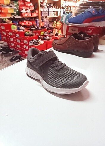 Nike NİKE REVOLUTION 4 GRİ ÇOCUK AYAKKABISI ORJİNAL KUTULU ÜRÜNDÜR