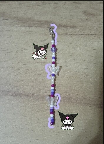 Şirin kuromi temalı anahtarlık gibi.