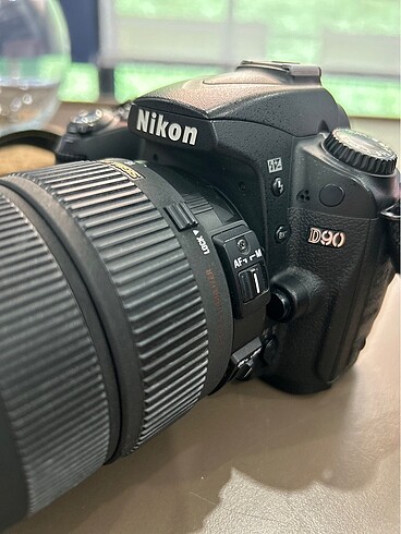 NIKON D90 body + Sigma 18-200mm lens