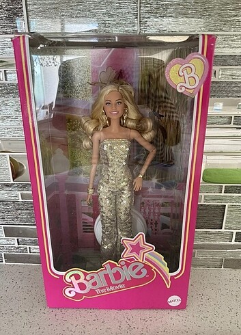Barbie Movie Barbie Gold Tulumlu Bebek HPJ99 