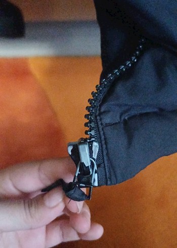 Mavi kaz tüyü yelek sıcacık tutar - Görsel 6