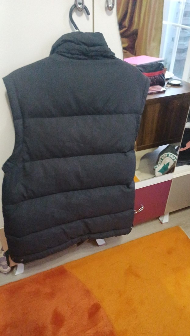 Mavi kaz tüyü yelek sıcacık tutar - Görsel 5