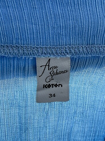 34 Beden mavi Renk Koton Bluz %70 İndirimli.