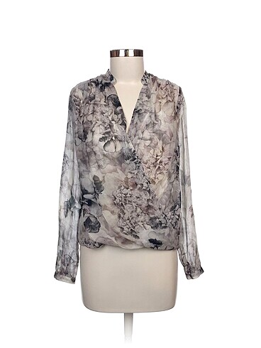 H&M Bluz %70 İndirimli.