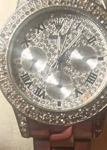 Beden Rolex taşlı kadran ve çerceve bayan saat.