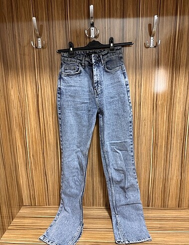 Yüksek bel bootcut jean yırtmaçlı paça