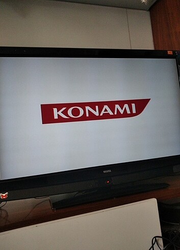 Sony Ps2 + 2 kol + 5 oyun + görüntü kablosu+ adaptör 