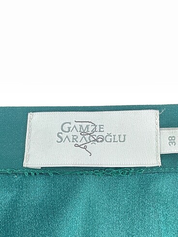 38 Beden yeşil Renk Gamze Saraçoğlu Midi Etek %70 İndirimli.