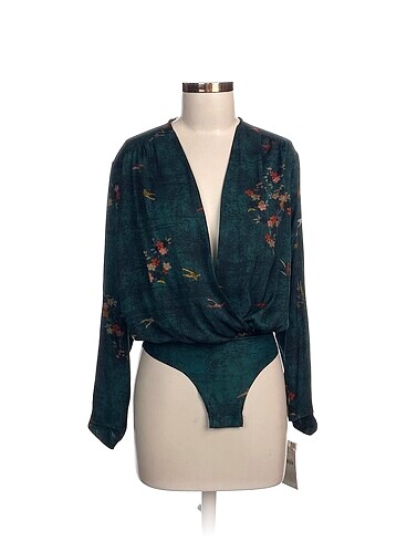 Zara Bluz %70 İndirimli.