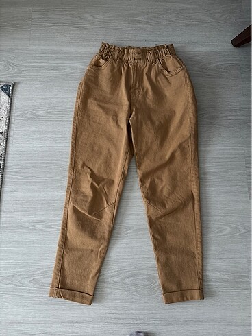 Beli lastikli pantolon