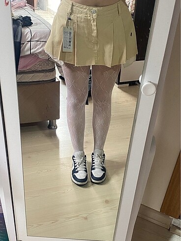 Ekru pileli mini denim etek
