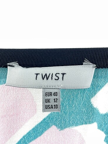40 Beden çeşitli Renk Twist Midi Etek %70 İndirimli.