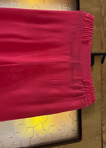 Trendyol & Milla Pembe Dökümlü Uzun Kadın Pantolon.yüksek bel ve ceplidir .