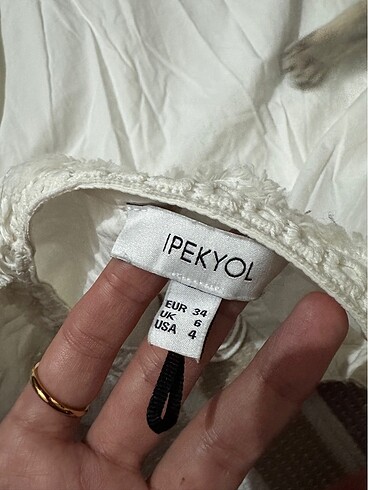İpekyol kremrengi kolları detaylı elbise