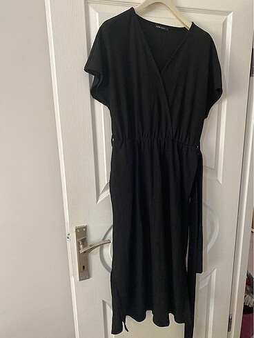 Lcw marka belden kemerli ve hafif yırtmaclı - Görsel 7