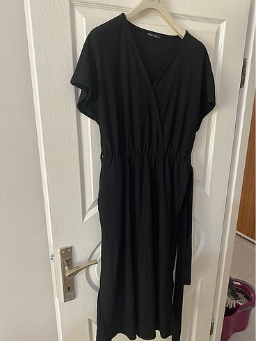 Lcw marka belden kemerli ve hafif yırtmaclı - Görsel 9