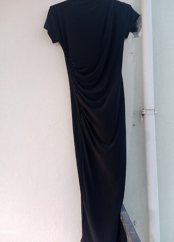 m Beden Gayet iyi durumda siyah diz altı büzgülü elbise