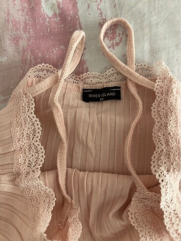 Pembe dantelli takim