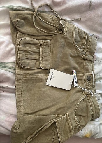 Kemer Detaylı Bej Mini Denim Etek