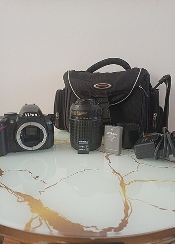 Nikon D3000 + 55-200mm lens 