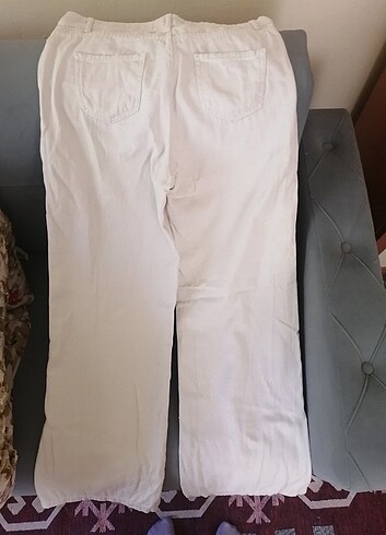 Krem renkli yüksek bel bol paça kot pantolon 