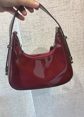 Bordo mini kol çantası 