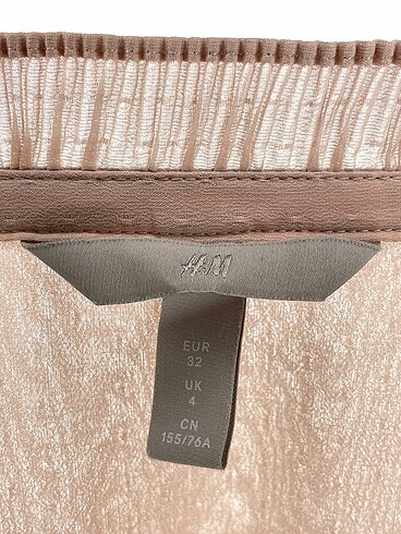 32 Beden ten rengi Renk H&M Bluz %70 İndirimli.