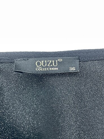 36 Beden siyah Renk Quzu Bluz %70 İndirimli.