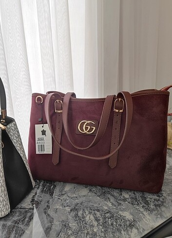 Gucci kol çantası bordo