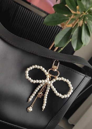 Accessorize Gold detay inci fiyonk çanta charmı