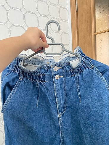 Beli lastikli kot pantolon