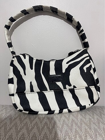 zebra desenli kol çantası