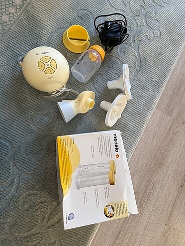 Medela sut sagma makinesi ve saklama siseleri