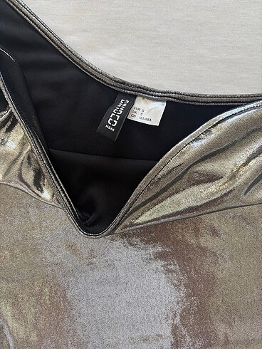 H&M tek kollu metalik crop