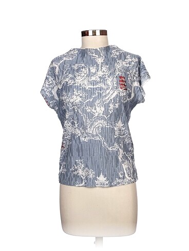 Zara Bluz %70 İndirimli.