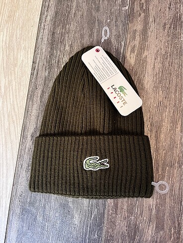 Lacoste bere
