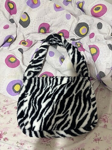 h&m zebra desenli peluş çanta