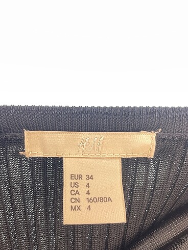 34 Beden siyah Renk H&M Uzun Elbise %70 İndirimli.
