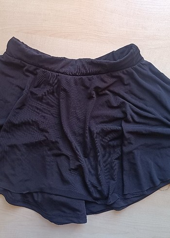 Siyah şortlu mini kadın etek