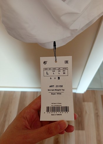 l Beden sırtı açık büzgülü top