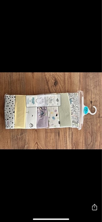 Primark 7?li zıbın. 6-9 ay 74 cm kısa kollu paketli yeni.
