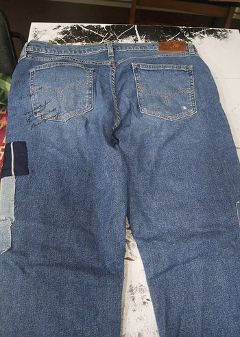 Düğmeli, bol kesim kadın kot pantolon - Görsel 3