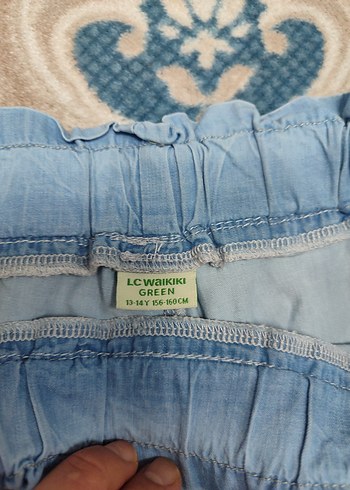 Mavi Renkli Volanlı Mini Kot Şort - Görsel 2