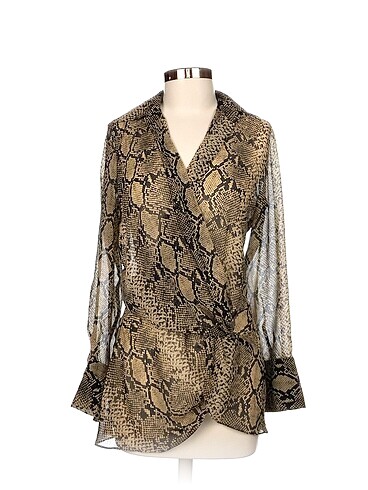 Zara Bluz %70 İndirimli.