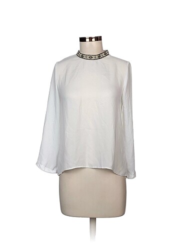 Zara Bluz %70 İndirimli.