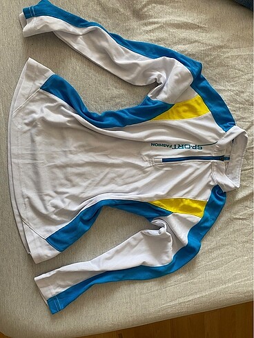 Spor üst